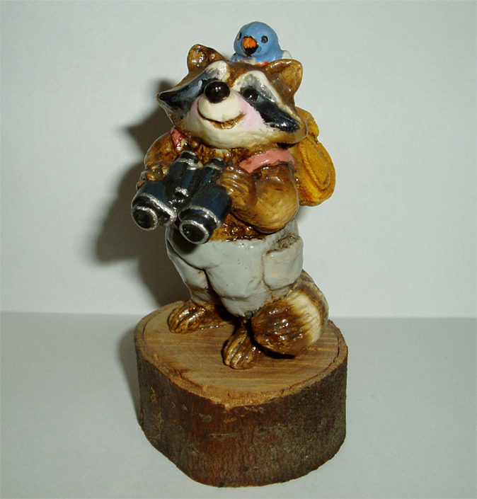 RC-3_Bird_Watcher_Raccoon_grey_pants_blue_bird