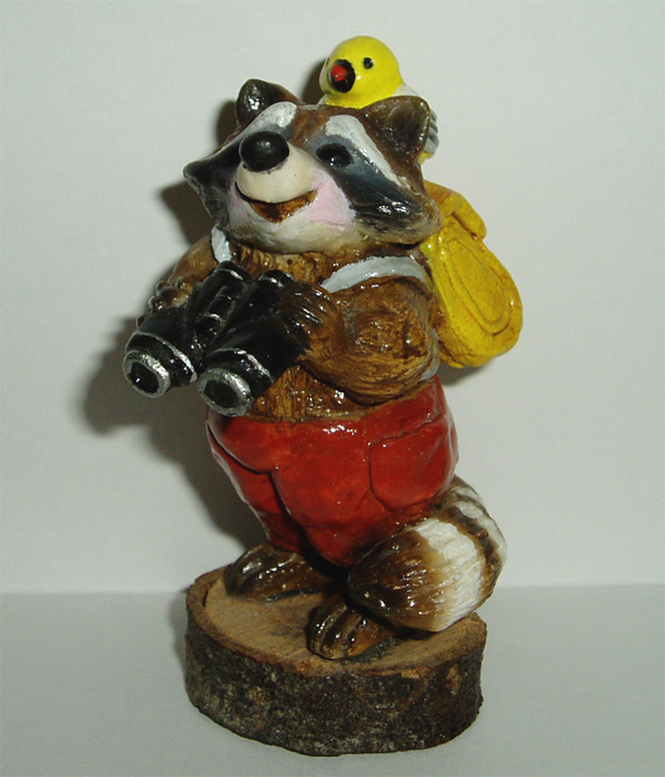 RC-3_Bird_Watcher_Raccoon_red_pants_yellow_bird