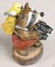 RC-3_Bird_Watcher_Raccoon_red_pants_yellow_bird_side